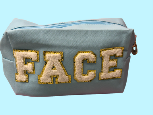 “FACE” pouch - medium - blue